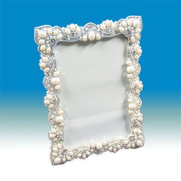 Rectangular silver-tone picture frame with a scalloped border of creamy pearls and crystals