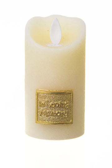 Ivory wax LED pillar candle with flame-shaped light and gold-tone In Loving Memory plaque