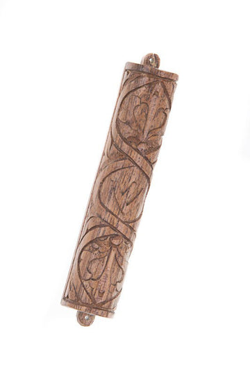 Teak wood mezuzah case carved with a winding vine and leaves, loops at each end