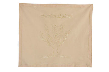 Bisque tan cotton challah cover with tonal embroidered Tree of Life and Shabbat Shalom script above