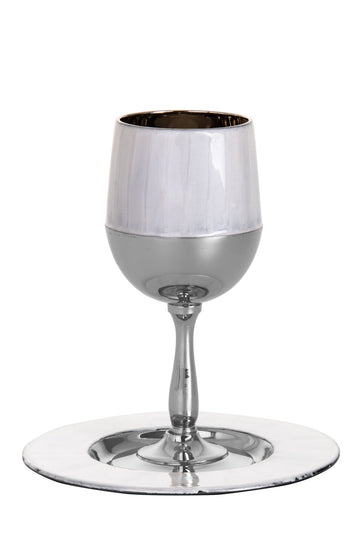 White enamel Kiddush cup with silver-tone stem standing on a round white-rimmed tray