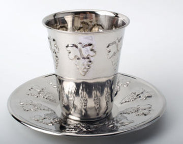 Polished stainless steel Kiddush cup and tray embossed with grape clusters