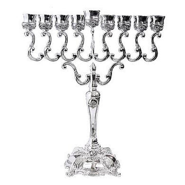 Large silver plated menorah with scrolling arms, tulip cups, raised shamash and square ornate base