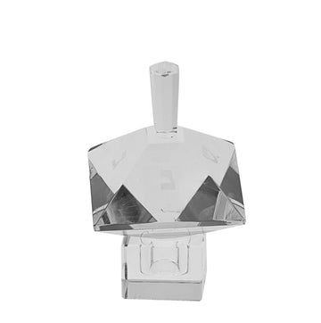 Double pyramid crystal dreidel with etched Hebrew letters on upper facets over a square stand