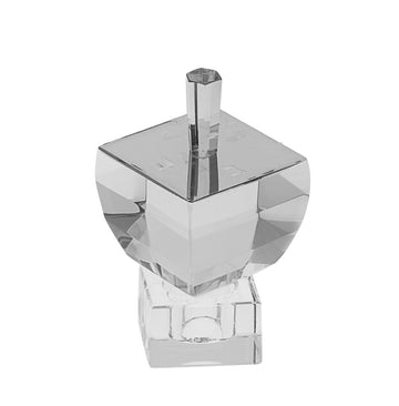 Crystal dreidel with square silver mirror top and faceted sides standing in a clear stand