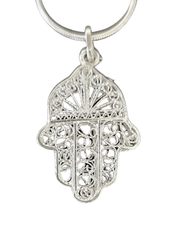 Sterling silver filigree hamsa with sunburst crown on a smooth snake chain