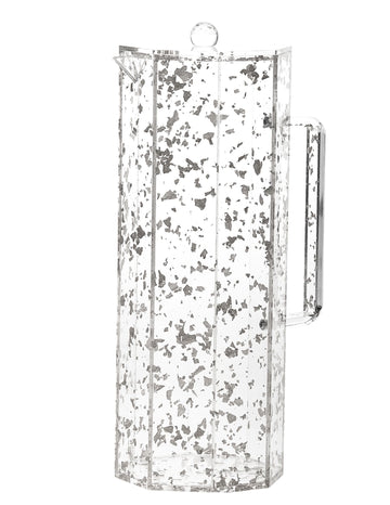 Faceted hexagonal lucite pitcher with silver flakes suspended in its clear sides