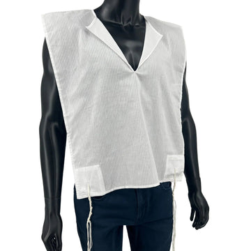 Boys' white cotton tallit katan on mannequin with tzitzit strings