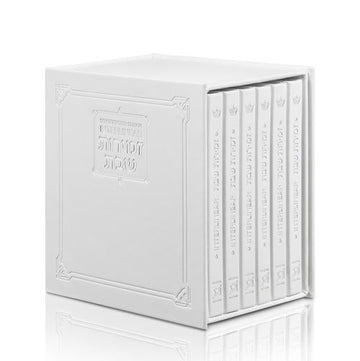 White faux leather with silver trim on a six-volume interlinear zemiros set, 6 by 6 inches.