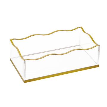 Wave guest towel holder, clear rectangular caddy with wavy gold rim and gold base, angled view
