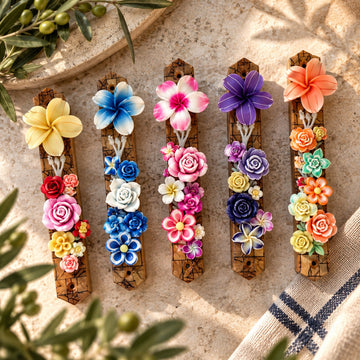 Garden of Shalom Floral Mezuzah Collection, row of wood mezuzah cases with colourful clay flowers