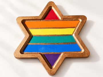 Rainbow-striped Star of David tray in natural wood on white