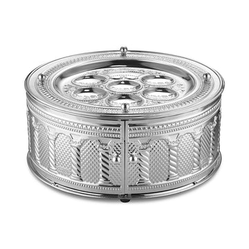 Round three-tier silver-plated seder plate with embossed columns and lattice panels, two front doors with ball handles and six Hebrew-labeled dishes on the top plate