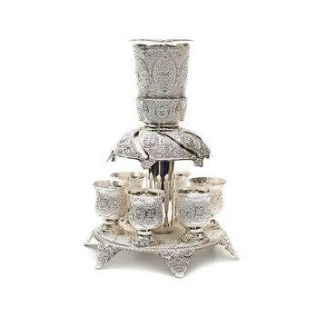 Silverplated filigree Kiddush wine fountain with a central pouring cup and six small cups