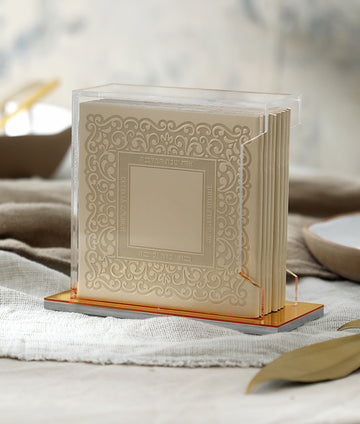 Simchonim Lucite stand holding Lacey zemiros in cream, shown on a table setting