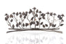 Wide bronze menorah of leafy branches bound at the base, with pearl accents and nine cups