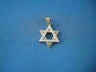 Two-tone gold Star of David pendant with a diamond-set upper triangle over a yellow gold triangle