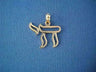 Openwork yellow gold Chai with polished outline and textured inner channel, on blue cloth