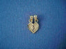Petite two-part gold-tone Mizpah heart with diamond cut edges and twin bails, on blue