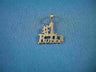 Gold charm with cut-out lettering spelling Bubbe under a number one, on blue fabric