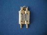 Yellow gold open Torah scroll charm showing twin tablets between two rollers, on blue