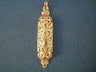 Long gold filigree mezuzah pendant with a Star of David and floral finials, on blue fabric