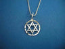 Classic silver Star of David inside a sparkling faceted ring, on a box chain over blue