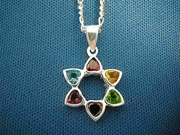 Star of David of six colored heart-cut stones in red, yellow, green and blue around an open center