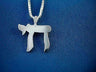 Mirror-polished silver Chai pendant on a box chain against royal blue fabric