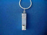 Rectangular silver mezuzah with a Star of David above and Ten Commandments tablets below