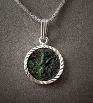 Authentic dark green ancient Maccabee coin in a twisted-edge silver bezel on a silver box chain
