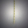 Fine yellow gold Figaro chain with alternating short and long links hanging straight down