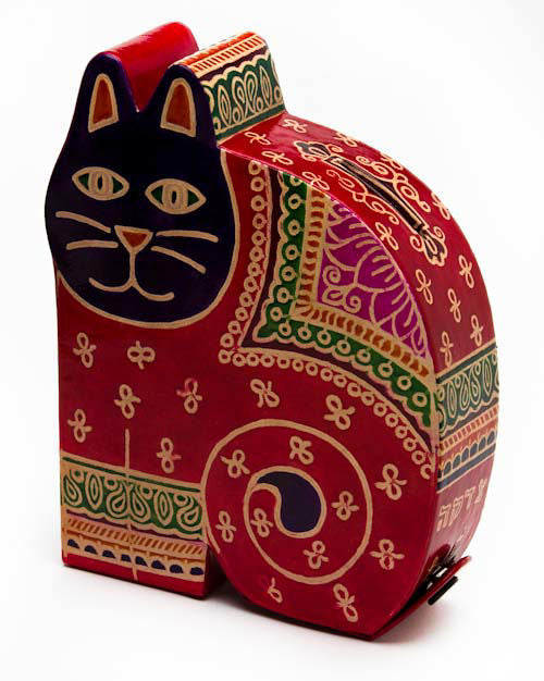 Seated red tooled leather cat tzedakah box with navy face and patterned coat