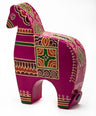 Pink tooled leather horse tzedakah box with green and gold folk patterns