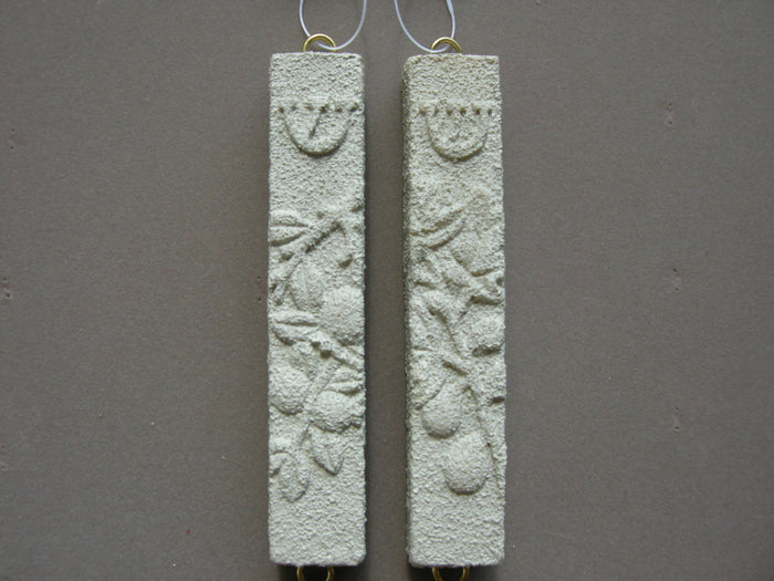 Sage Brush green stone fig mezuzah case with raised leaves, shown as a pair with shin