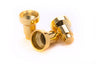 Three polished brass menorah candle inserts with cup tops and narrow pegs