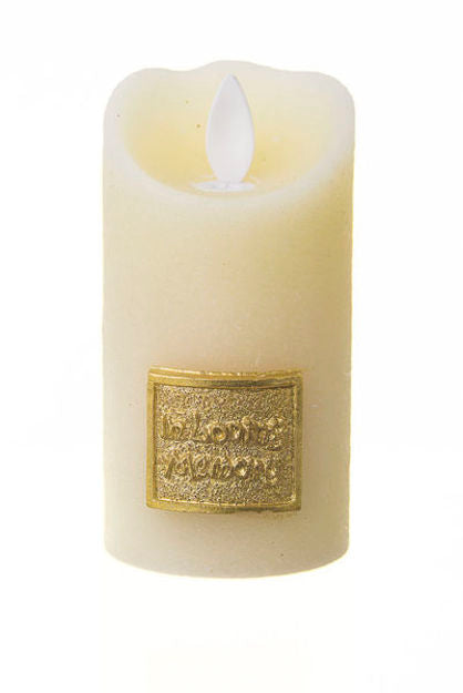 Ivory wax LED pillar candle with flame-shaped light and gold-tone In Loving Memory plaque