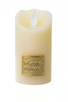 Ivory wax LED pillar candle with flame-shaped light and gold-tone In Loving Memory plaque