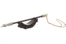 Two-tone carved yad with white pointing hand and dark shaft resting on a dark carved stand, gold-tone chain attached