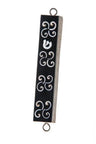 Dark teak mezuzah case with white shell scroll inlays, a shell Shin and metal hanging loops