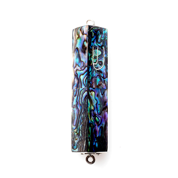 Triangular abalone mezuzah case in iridescent blue and green with a sterling silver Shin and end loops