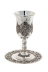 Silver plated Kiddush cup with embossed grape clusters on a tray with grape border
