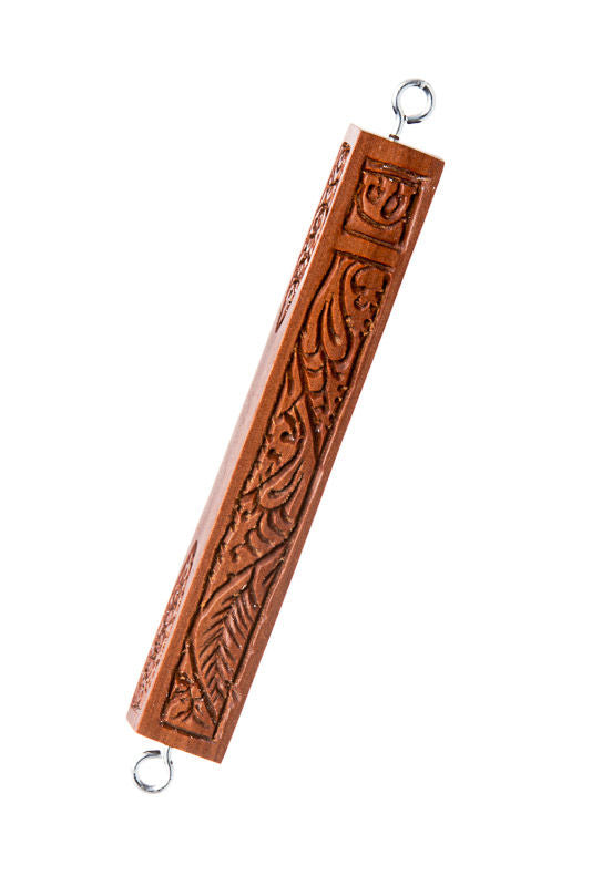 Carved wood mezuzah case with sweeping leaf relief, shin at top and loops at both ends