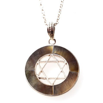 Round pendant with open sterling silver Star of David inside a black mussel shell ring on a silver chain