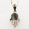 Petite Hamsa with grey mussel shell inlay in a sterling frame, rope-detail bail, on white