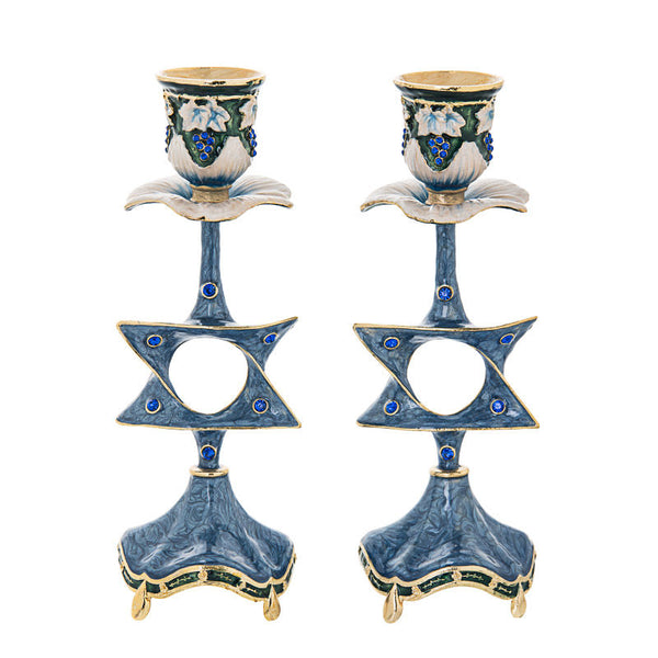 Pair of blue enamel candlesticks with open Star of David stems, blue stones and gold-tone feet