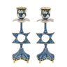 Pair of blue enamel candlesticks with open Star of David stems, blue stones and gold-tone feet