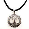 Round openwork Tree of Life pendant with knotwork branches and roots on a black silk cord
