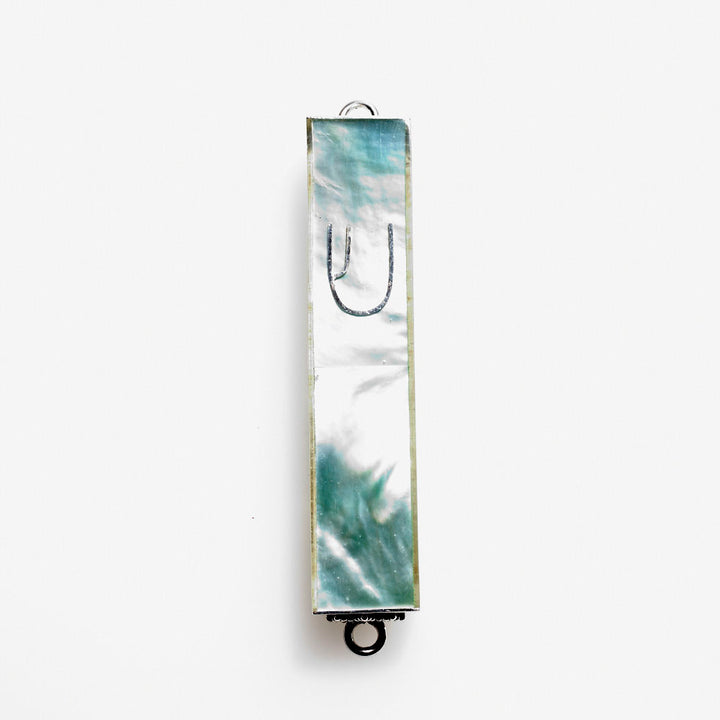 Green and white mother of pearl mini mezuzah case with silver shin and silver edge frame