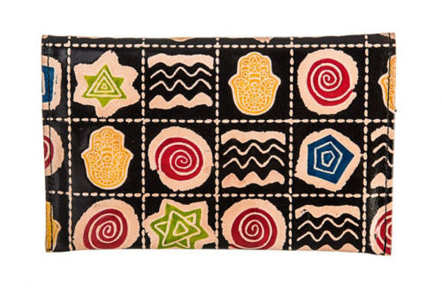 Back of the leather hamsa purse showing green stars, blue pentagons and red spiral tiles